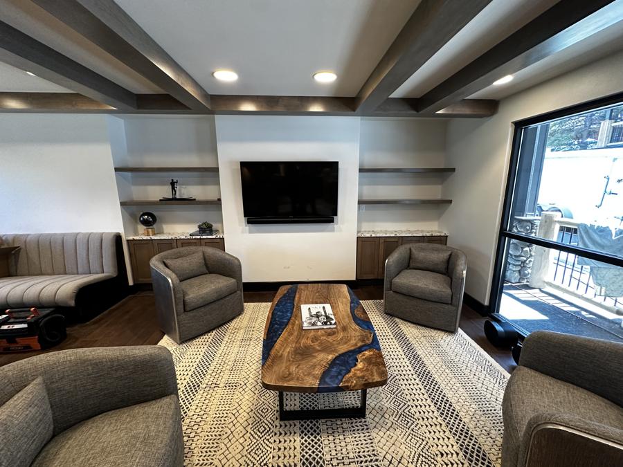 Coffered-ceiling lounge with built-ins
