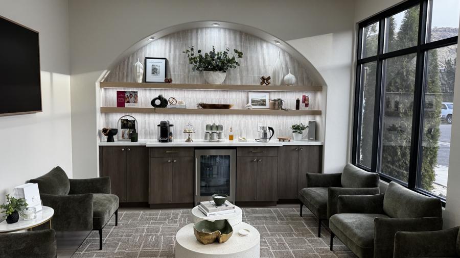 Arched display wall with accent lighting